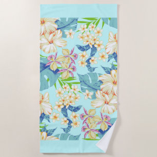 Tropisches Flair mit blauem Strandtuch