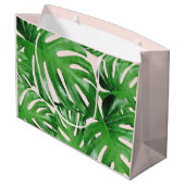 Tropisches Monstera-Blätter Wasserfarbe Rosa Große Geschenktüte (Rückseite Schrägansicht)