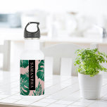 Tropisches Pink und grüne Palme Blätter Muster und Edelstahlflasche<br><div class="desc">Das tropische Blätter Pink & Green Palm ist ein lebendiges Design, das Naturelemente und tropische Ästhetik vereint. Die Blätter sind in Rosa und Grün gehalten, bilden einen auffallenden Kontrast und wirken eindrucksvoll. Das tropische Pink und Green Palm Blätter ist ein lebendiges und visuell faszinierendes Design, das die Schönheit der Natur...</div>