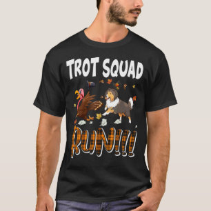 TrottSquad mit orangefarbener Karierter Sheltie mi T-Shirt