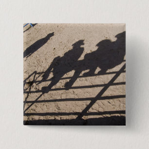 Tucson, Arizona: Schatten von Rodeo-Teilnehmern Button