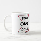 Tür-Café Adrians des Weg-66 verbogenes Texas mit Kaffeetasse (Links)