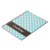 Türkis-blaues Rot-Gänseblümchen-gewundenes Notizblock (Linke Seite)