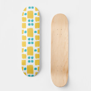 Türkis und gelb gestrichene Formen Skateboard