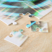 Türkisblaues Rad auf Abstraktem schwarzen Muster Puzzle (Seite)