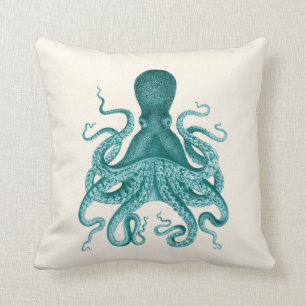 Türkise Kraken-Illustration auf Creme Kissen