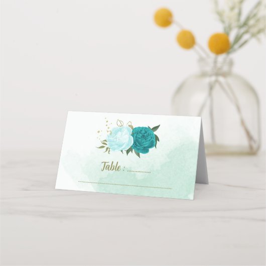 türkisfarbene Blume, grüne Blätter Platzkarte (Vorderseite)