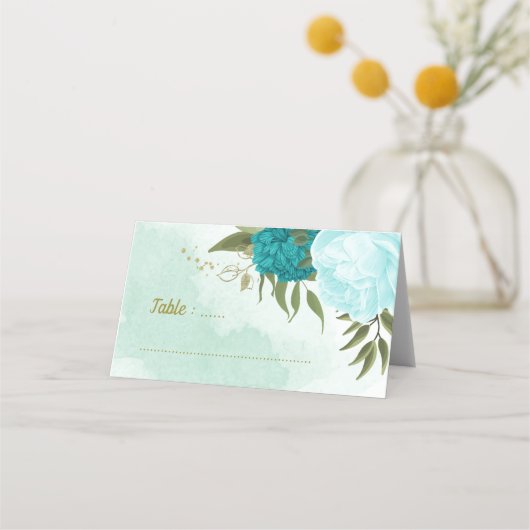 türkisfarbene Blume, grüne Blätter Platzkarte (Vorderseite)