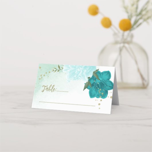 türkisfarbene Blume, grüne Blätter Platzkarte (Vorderseite)