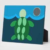 turtle swimming at midnight. fotoplatte (Seite)