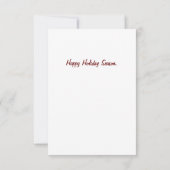 Tuxedo Katze spielt auf einem Weihnachtsbaum. (Rückseite)