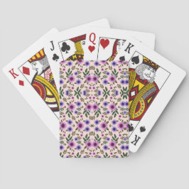 Two images showing playing cards with a floral spielkarten