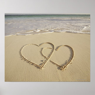 Two overlying hearts drawn on the beach poster