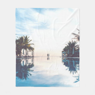 Two person standing beside swimming pool fleecedecke