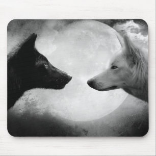 Two wolves facing each other mousepad