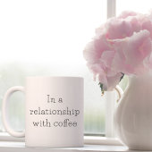 Typografie in einem Zusammenhang mit Kaffee Kaffeetasse