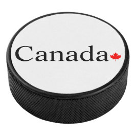 Typografie mit rotem Ahornblatt in Kanada Eishockey Puck