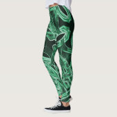 Überkreuzte und überlappende grüne Acrylbandaussch Leggings (Links)