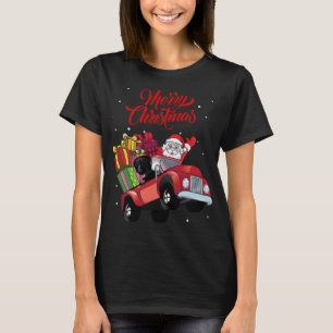 Überzogener Retriever mit dem Weihnachtsmann in ro T-Shirt