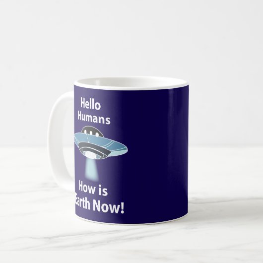 UFO Hallo Menschen Wie ist die Erde jetzt UFO Kaffeetasse (Vorderseite Links)