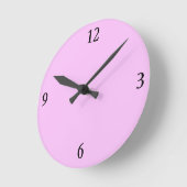 Uhr der Wand in Rosa (Winkel)