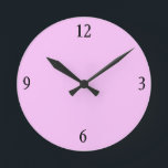 Uhr der Wand in Rosa<br><div class="desc">Diese rosa Wanduhr wird mit den passenden Kissen,  Serviertabletten,  Bilderrahmen und Lichtschaltern in diesem Laden in derselben Kaugummi-Rosa-Farbe fabelhaft aussehen.</div>
