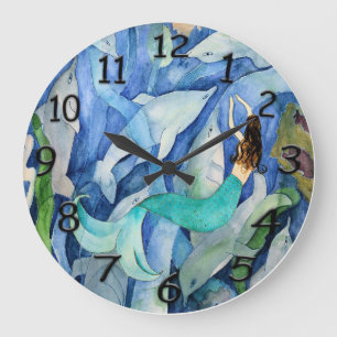 Uhr mit Delfinen und Meerjungfrau an der Wand