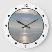 Uhr - Sonnenüberstrahlung im Ozean (Vorderseite)