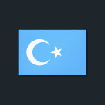 Uighurische Flagge Ostturkistans (Uighuristan) Leinwanddruck<br><div class="desc">Dieses Design zeigt die Nationalflagge der Ersten Republik Ostturkestan, einer islamischen Republik, die 1933 gegründet wurde, die kurz gelebt und abtrünnig war. Die Fahne ist bekannt als Kökbayraq (К ө к б й р а Nachahmung), was "Himmelsflagge" oder "Blaue Flagge" bedeutet. Die Fahne hat einen weißen Halbmond (Wachsmond) auf hellblauem...</div>