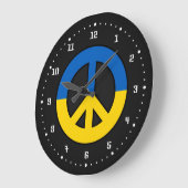 Ukrainian peace sign on a black background große wanduhr (Winkel)