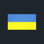 ukrainische Flagge, ukrainische Slawin Ukraini С л Leinwanddruck<br><div class="desc">Die Farben der ukrainischen Flagge, blau und gelb, sind seit Jahrhunderten über ein Land geflogen, das reich an Geschichte und Geist ist. Blau repräsentiert den riesigen ukrainischen Himmel, während Gelb die goldenen Weizenfelder symbolisiert, die sich über die fruchtbaren Ebenen erstrecken. Dieses einfache, aber mächtige Symbol ist zu einem Leuchtfeuer der...</div>