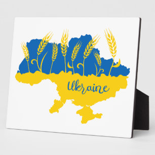 Ukrainische Typografie und Weizenohr auf ukrainisc Fotoplatte
