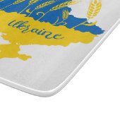 Ukrainische Typografie und Weizenohr auf ukrainisc Schneidebrett (Ecke)
