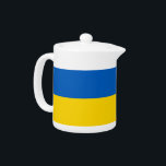 Ukrainischer Flaggenteapot<br><div class="desc">Fügen Sie Ihrer Teesammlung eine Touch ukrainischen Stolzes hinzu mit unserem exklusiven Teekessel mit der Flagge der Ukraine! Dieser Teekessel, der mit viel Liebe zum Detail gestaltet wurde, ist nicht nur ein funktionaler Gegenstand, sondern ein Feiern des ukrainischen Erbes und des kulturellen Stolzes. Das lebendige Design zeigt die berühmte ukrainische...</div>