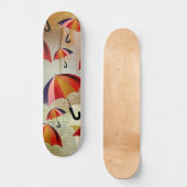 UMBRELLA PATTERNS IN A CAPTIVATING COLLAGE SKATEBOARD (Vorderseite)