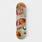 UMBRELLA PATTERNS IN A CAPTIVATING COLLAGE SKATEBOARD (Vorderseite)