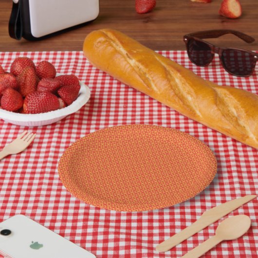 Umschlagpapier mit einem Muster in orangefarbenem, Pappteller (Picknick)