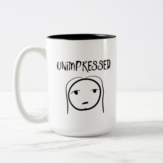 Unbeeindruckte Tasse (Links)