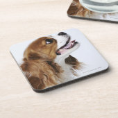Unbekümmerter Königcharles Spaniel Untersetzer (Linke Seite)