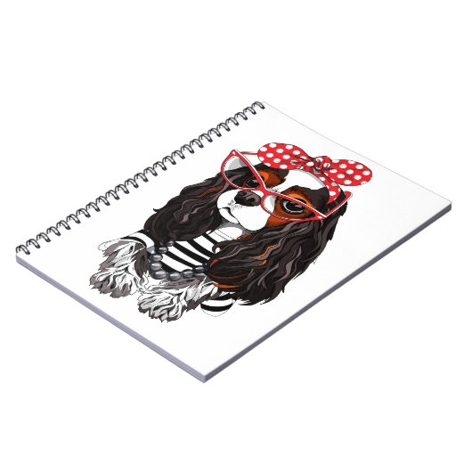 Unbekümmerter Königcharles Spaniel von Paris mit Notizblock (Linke Seite)