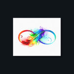 Unendliches Symbol mit Regenbogenfederhalter Leinwanddruck<br><div class="desc">Künstlich gezeichnet Unendlichkeitssymbol mit schöner Regenbogenfeder auf weißem Hintergrund. Tattoo-Stil.</div>