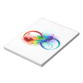 Unendliches Symbol mit Regenbogenfederhalter Notizblock (Rotiert)