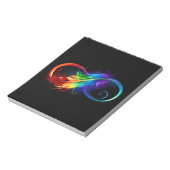 Unendliches Symbol mit Regenbogenfederhalter Notizblock (Rotiert)