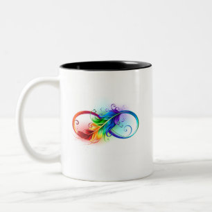 Unendliches Symbol mit Regenbogenfederhalter Zweifarbige Tasse