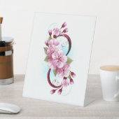 Unendlichkeit mit Sakura Blossom-Blume Sockelschild (In SItu)