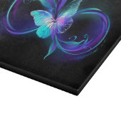 Unendlichkeit mit Zauberschmetterling glänzen Schneidebrett (Ecke)