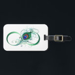 Unendlichkeitssymbol mit Peacock Feather Gepäckanhänger<br><div class="desc">Das Symbol der Unendlichkeit mit einer hellen,  grünen,  künstlerischen Pfauenfeder auf weißem Hintergrund. Tattoo-Stil.</div>