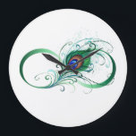Unendlichkeitssymbol mit Peacock Feather Große Wanduhr<br><div class="desc">Das Symbol der Unendlichkeit mit einer hellen,  grünen,  künstlerischen Pfauenfeder auf weißem Hintergrund. Tattoo-Stil.</div>