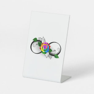 Unendlichkeitssymbol mit Rainbow-Rose Sockelschild