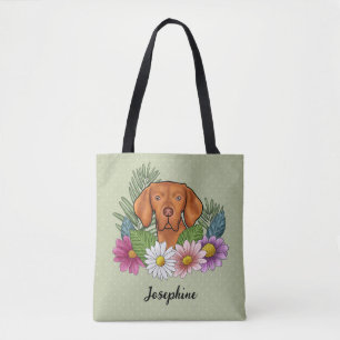 Ungarischer Vizsla mit farbenfrohen Blumen und Nam Tasche